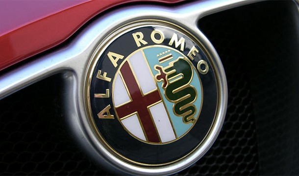 The Alfa Romeo logo has a snake eating a human