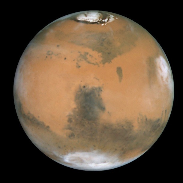 Mars_and_Syrtis_Major showing polar ice caps