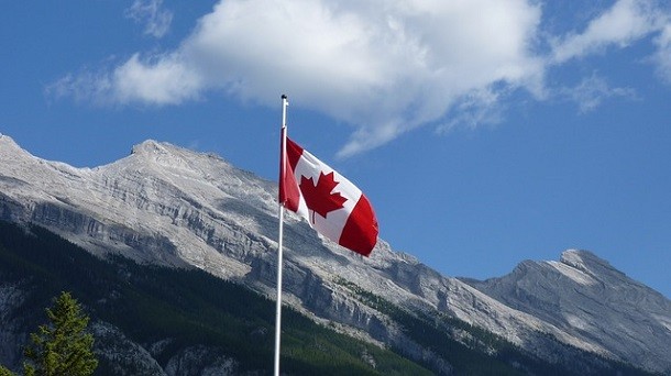 canada mountains with flag