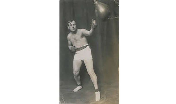 At 5' 7", Tommy Burns was the shortest heavyweight boxer ever. What he was really known for, however, was his respect for other fighters, especially of different races. That was something that didn't exist in his day.