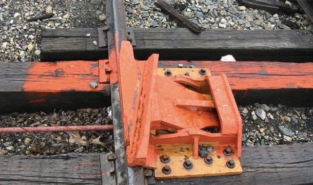 A derailer is a device that deliberately derails trains when they enter unauthorized areas