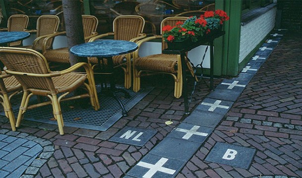 Belgium's border with the Netherlands is extremely convoluted. In the town of Baarle-Hertog, some of the buildings are even split right down the middle between the two countries.