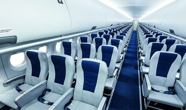 The aisle armrests can actually be raised. Usually there is a small divot underneath it that you need to push. The flight attendant may ask you to put it back though.