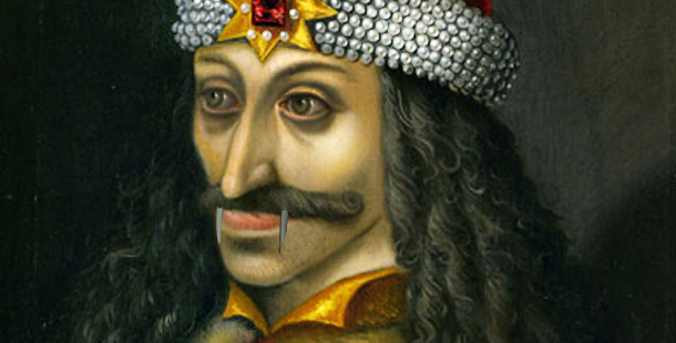 A person with a mustache wearing a crown