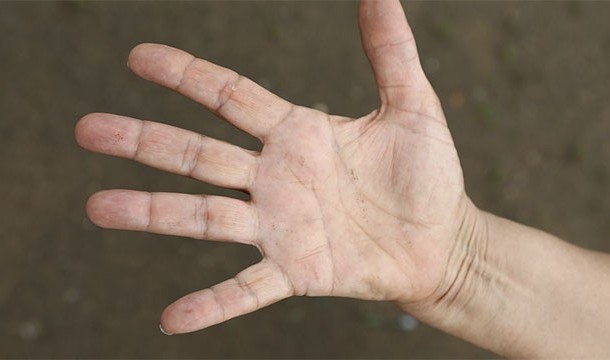 The first finger of a females hand is usually longer than the third. With males, it's usually the other way.