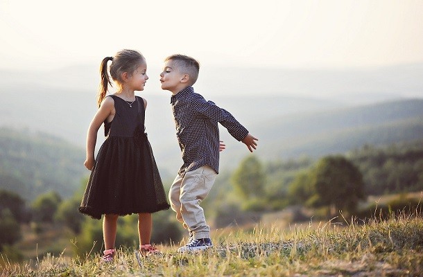 boy and girl about to kiss