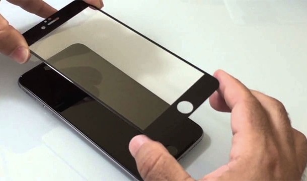 Putting a screen protector on a phone
