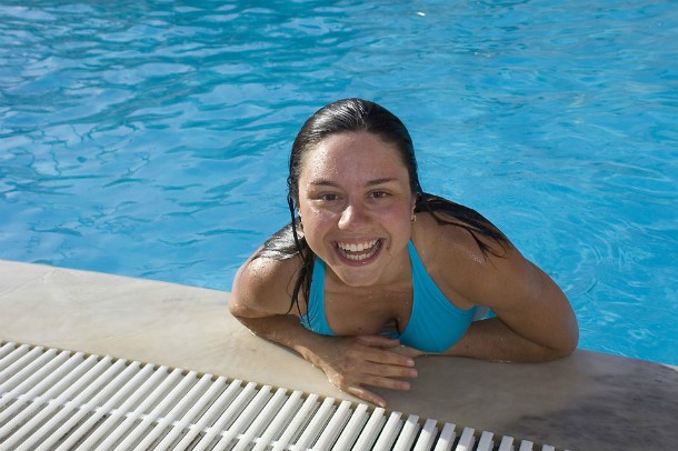 a-beautiful-young-woman-having-fun-in-a-pool-pv