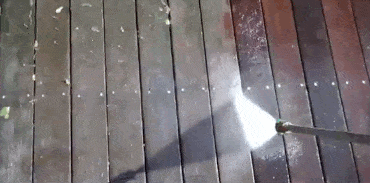 Power washing a deck