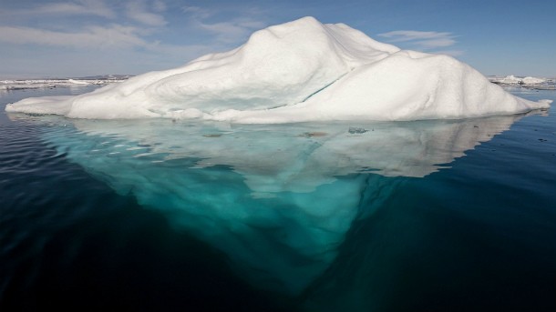 iceberg_in_the_arctic_with_its_underside_exposed