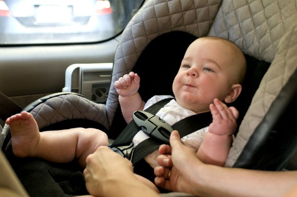 baby-in-a-back-seat-located-child-safety-seat