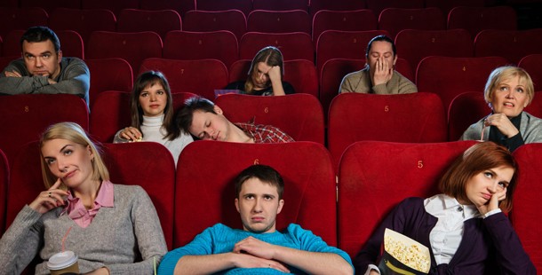 A group of people sitting in a movie theater
