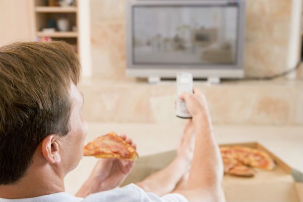 eating pizza in front of tv