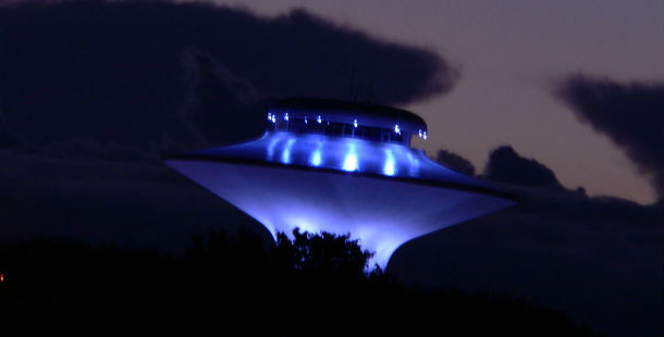A large ufo with blue lights
