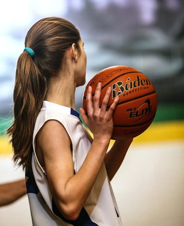 girl playing basketball