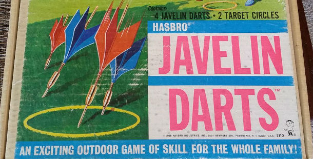 A box of darts on a field