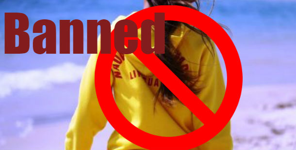 A person wearing a yellow sweatshirt