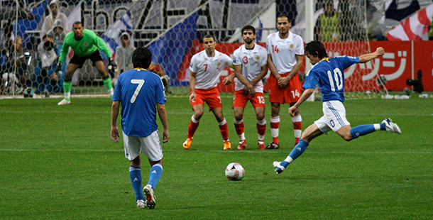 A group of men playing football