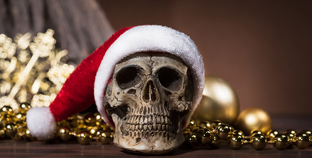 A skull wearing a santa hat