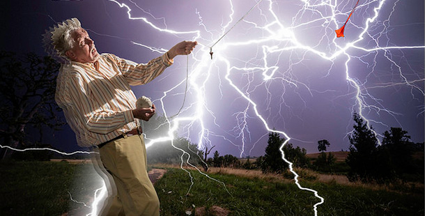 A person holding a lightening rod