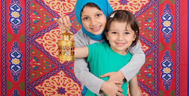an intriguing ramadan with two childs holding a lantern