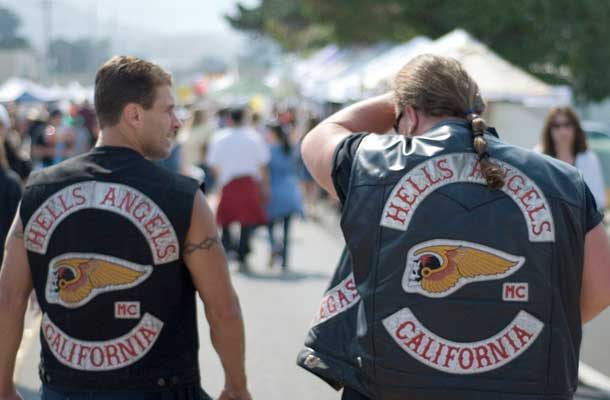 Backs of two Hells Angels members with leather jackets