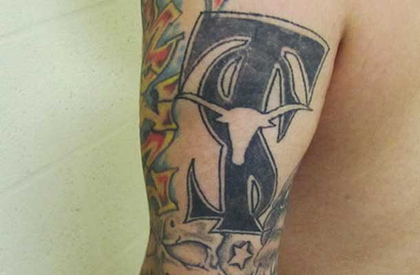 Close up of Texas Syndicate forearm tatoo