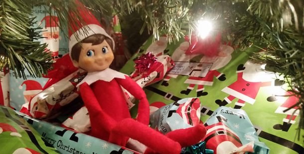 Elf on the Shelf under Christmas tree