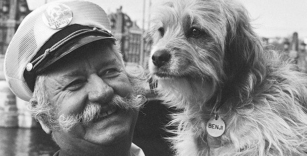 A person and dog with a mustache