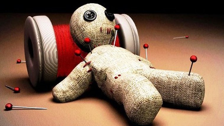 A doll lying on a red tube