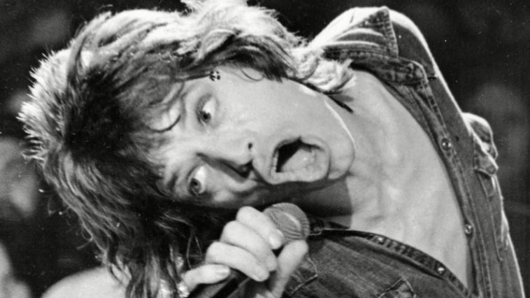 Facts about mick jagger holding a microphone