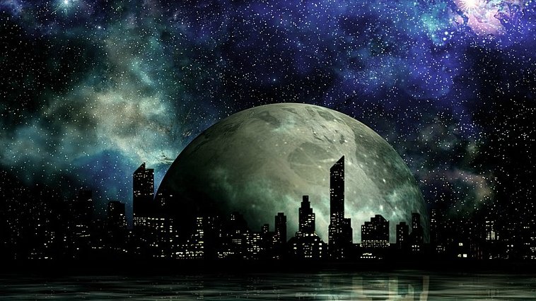 A moon over a city