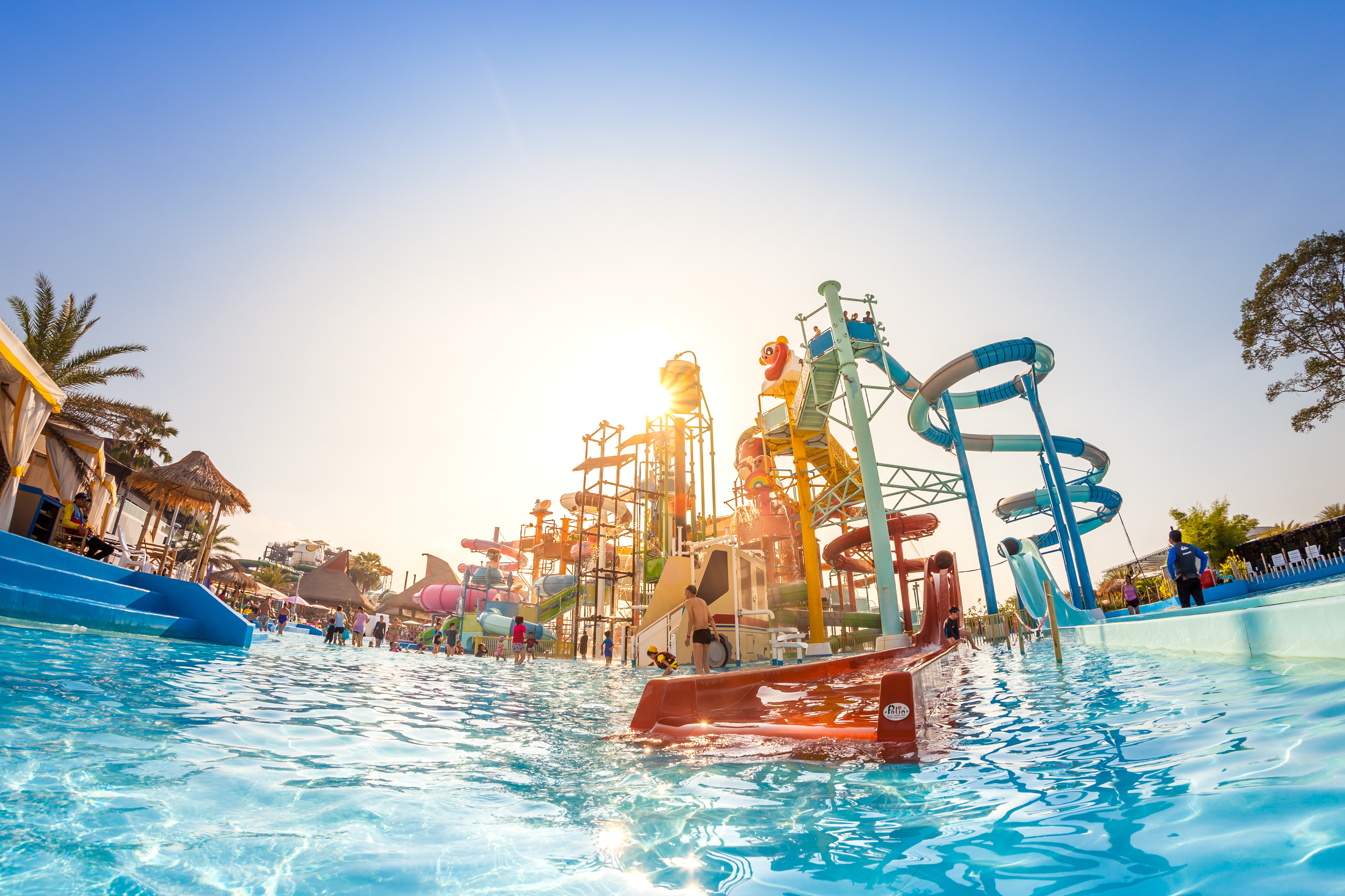 Water park with water slides and people
