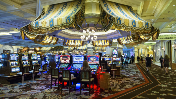 bellagio-hotel--people-playing-slot-machines-461673789-592436b25f9b58f4c0803d88