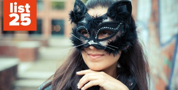 A person wearing a cat mask