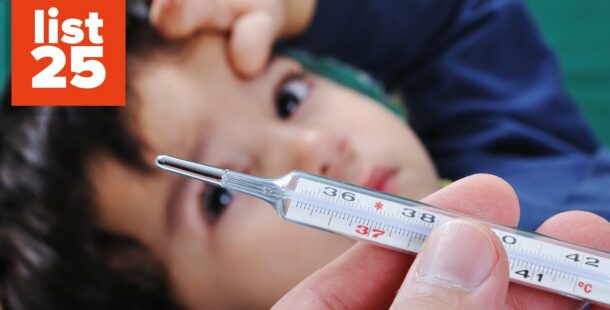 A person holding a thermometer